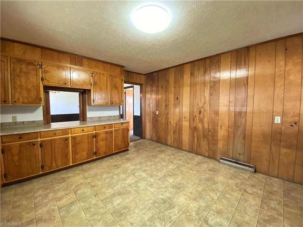 912 Rierson Road Madison, NC 27025 - Photo 6 of 37 Additional view of kitchen and entrance to dining room