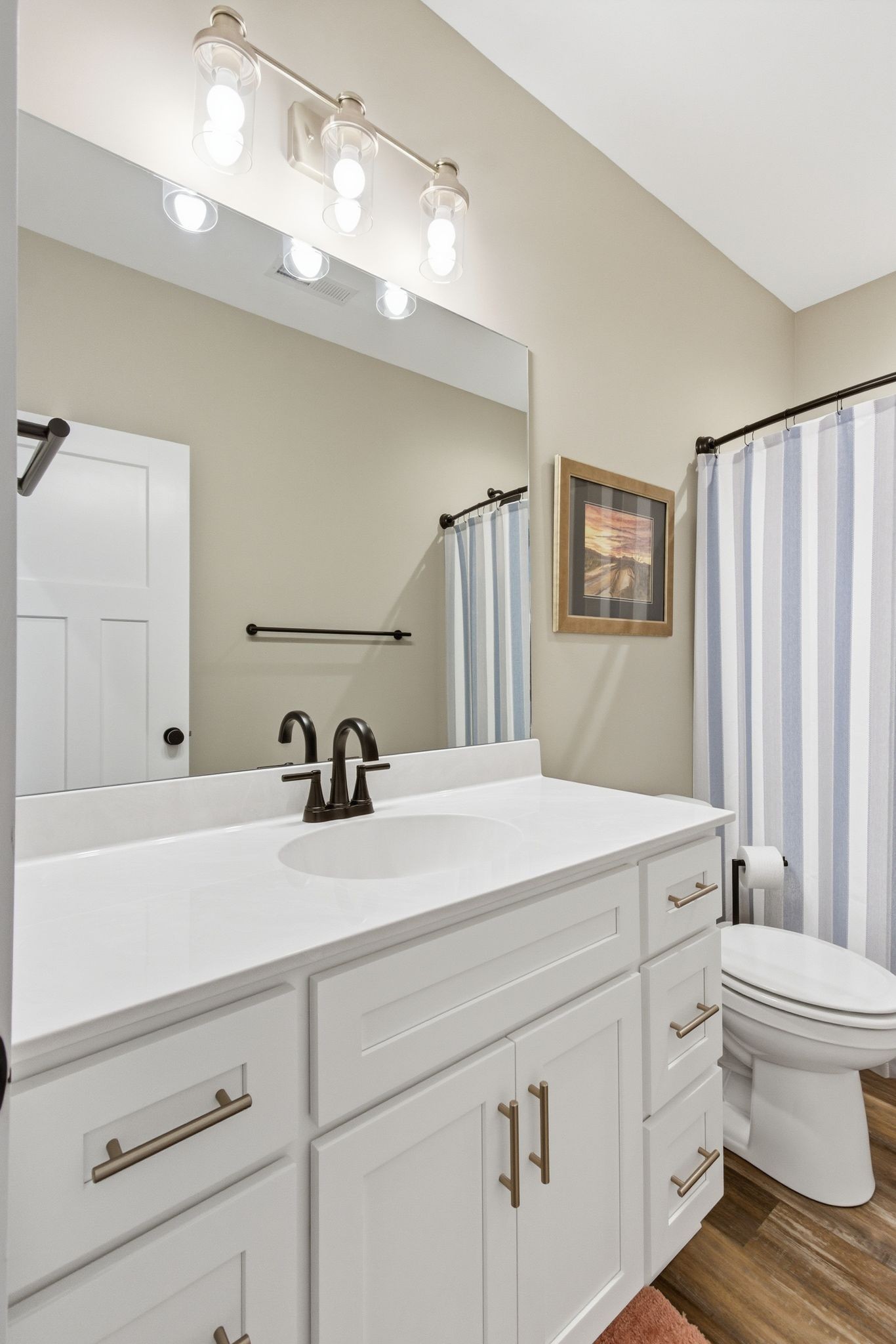 2705 Mc Connell Road Cornersville, TN 37047 - Photo 26 of 41 a bathroom with a sink a toilet and a mirror