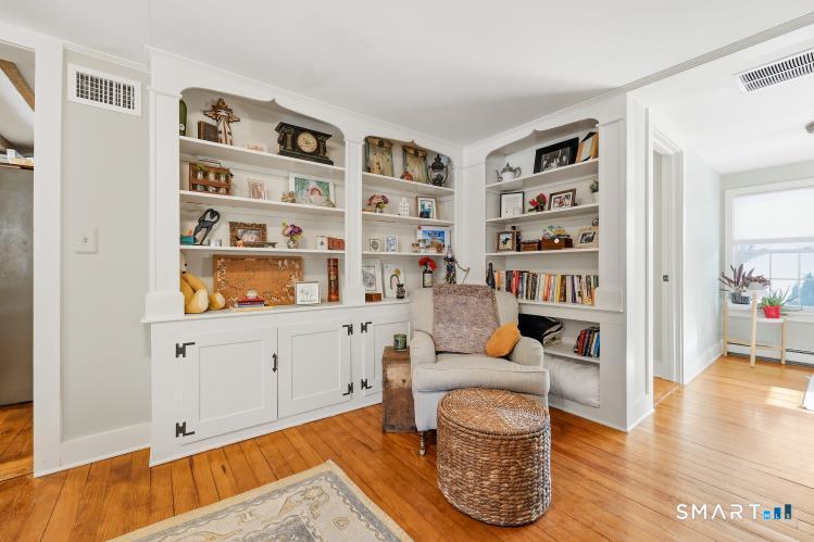 402 Boston Street Guilford, CT 06437 - Photo 15 of 40 Lots of character with extensive bookcases and lower cabinets