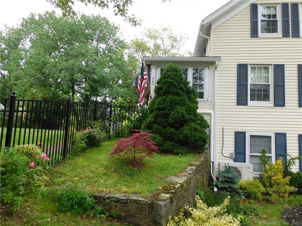 402 Boston Street Guilford, CT 06437 - Photo 2 of 40 Leads to front door at porch through gate
