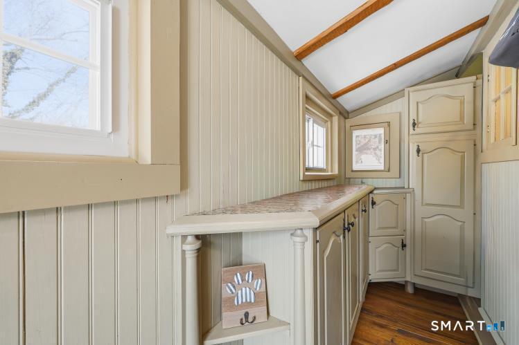 402 Boston Street Guilford, CT 06437 - Photo 10 of 40 Side/rear door leads into adorable pantry, then into kitchen