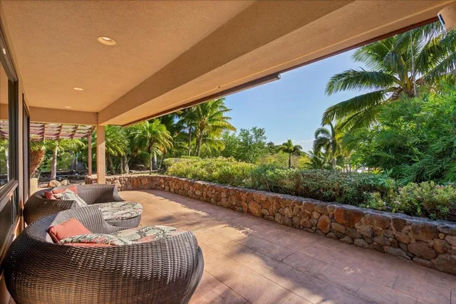 a outdoor living space with furniture and garden view