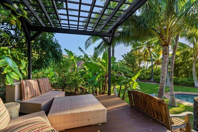 a outdoor living space with patio furniture and garden