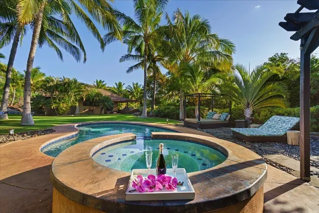 a view of swimming pool having outdoor seating