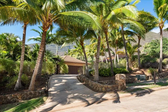a car and bike parked in a garage
