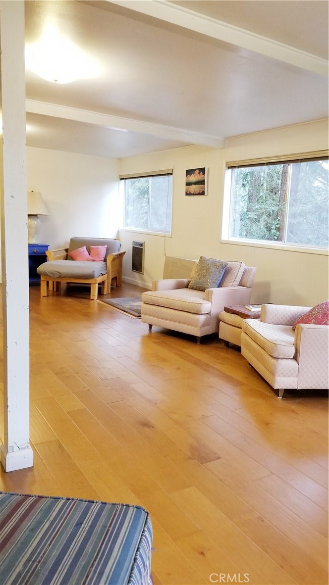 21455 Delta Way, Unit 2 Monte Rio, CA 95462 - Photo 11 of 48 a living room with furniture and a large window