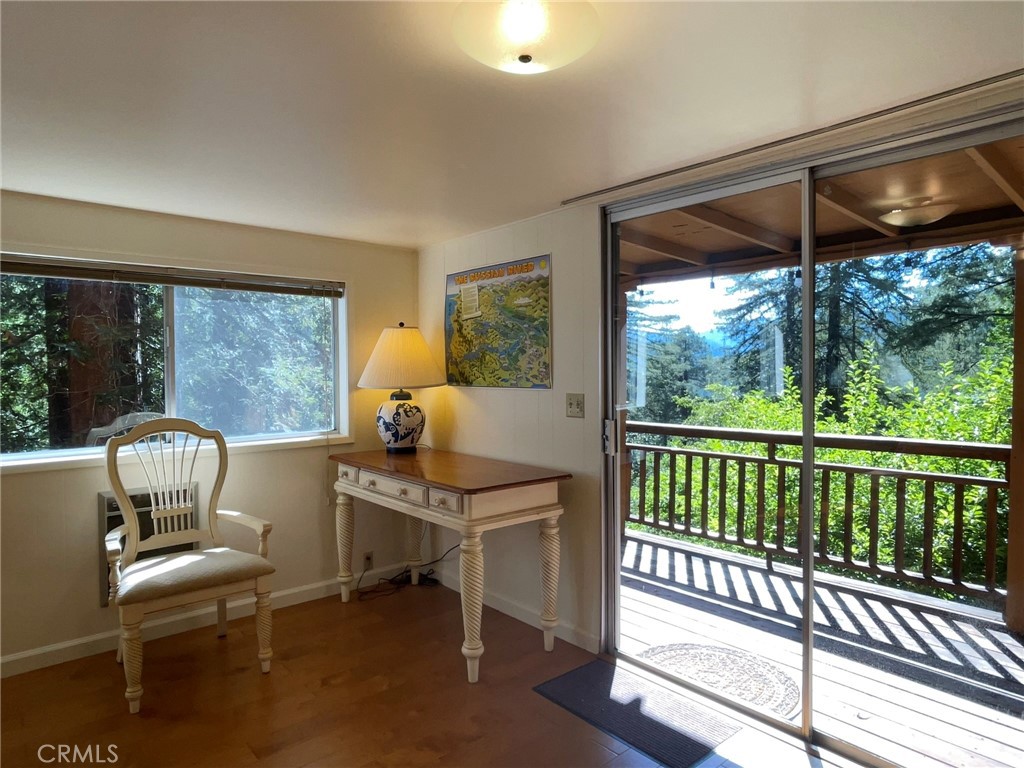 21455 Delta Way, Unit 2 Monte Rio, CA 95462 - Photo 16 of 48 a living room with furniture and a window
