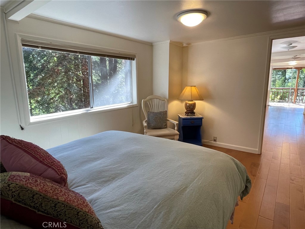 21455 Delta Way, Unit 2 Monte Rio, CA 95462 - Photo 28 of 48 a bedroom with a bed and window