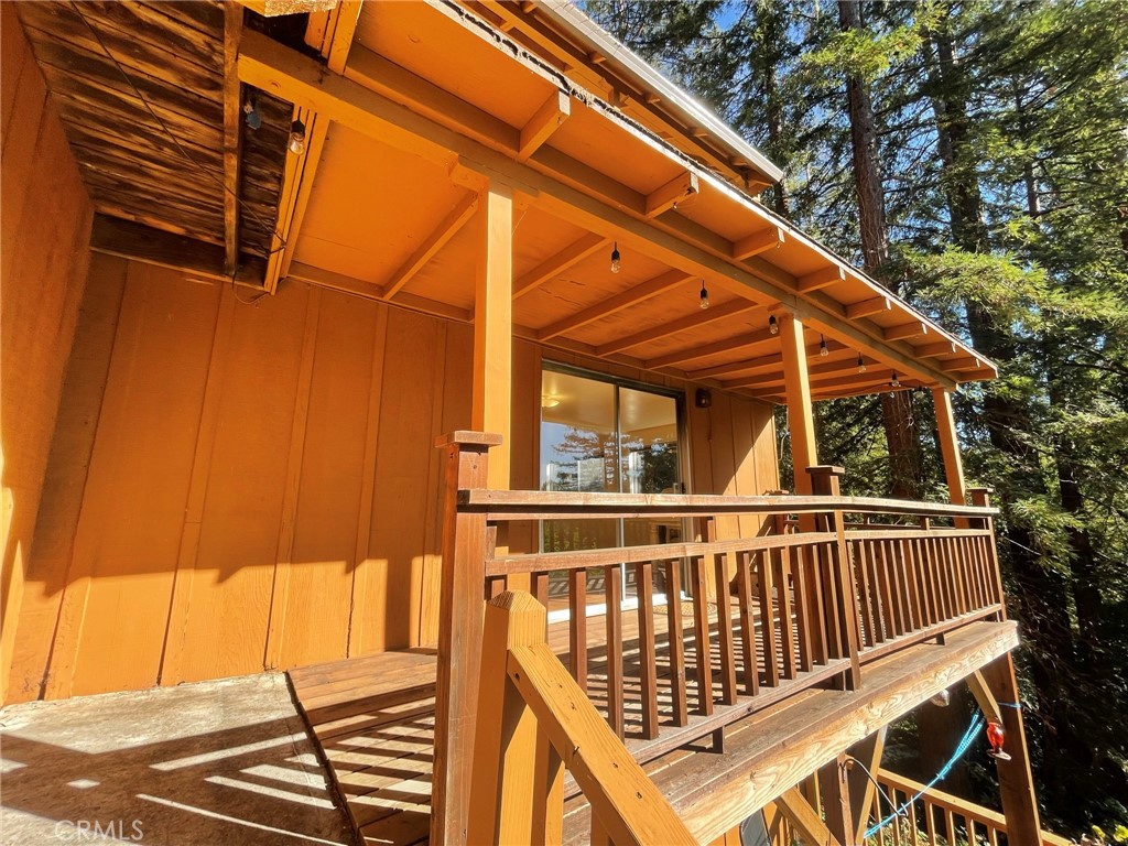 21455 Delta Way, Unit 2 Monte Rio, CA 95462 - Photo 44 of 48 a view of balcony with wooden floor and fence