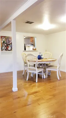 a view of a dining room with furniture
