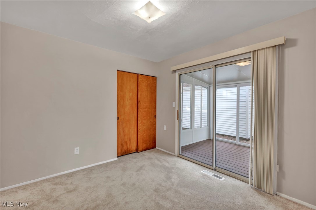 267 Barrett Road Berea, OH 44017 - Photo 29 of 41 Unfurnished bedroom with light colored carpet and a closet