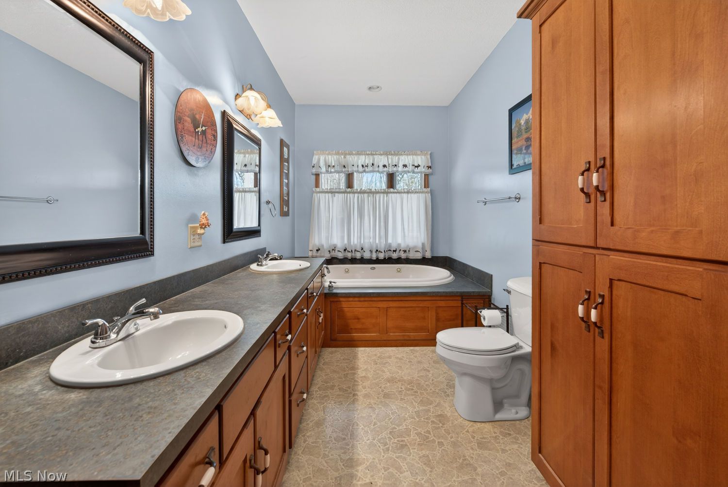 5042 Shawnee Road Carrollton, OH 44615 - Photo 18 of 48 First floor owner's bathroom with double sinks, separate shower and jacuzzi tub