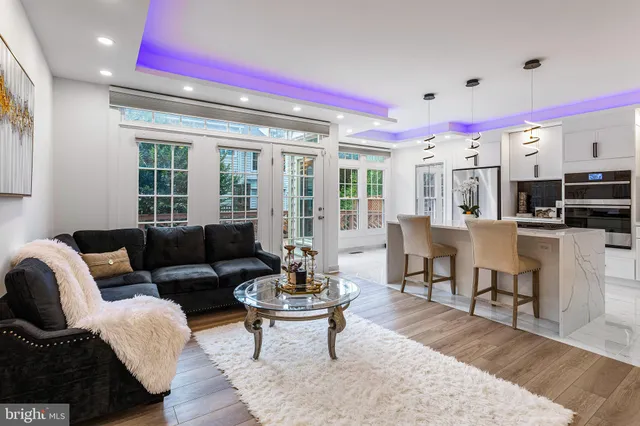 a view of entryway with wooden floor and stair