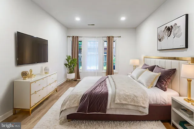 a view of a patio with table and chairs