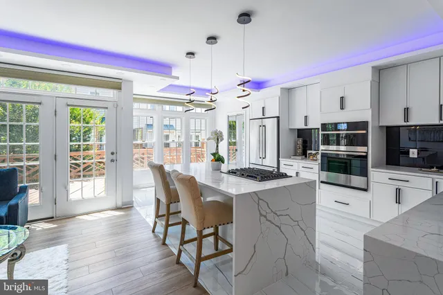 a bathroom with a sink a toilet and a bathtub