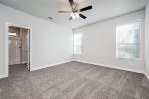 254 Lunayena Road Rhome, TX 76078 - Photo 7 of 8 an empty room with windows and fan