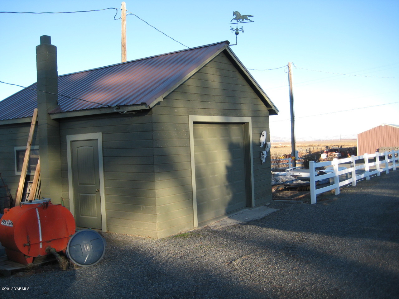 6591 West Wapato Road Wapato, WA 98951 - Photo 44 of 46 a backyard of a house with table and chairs