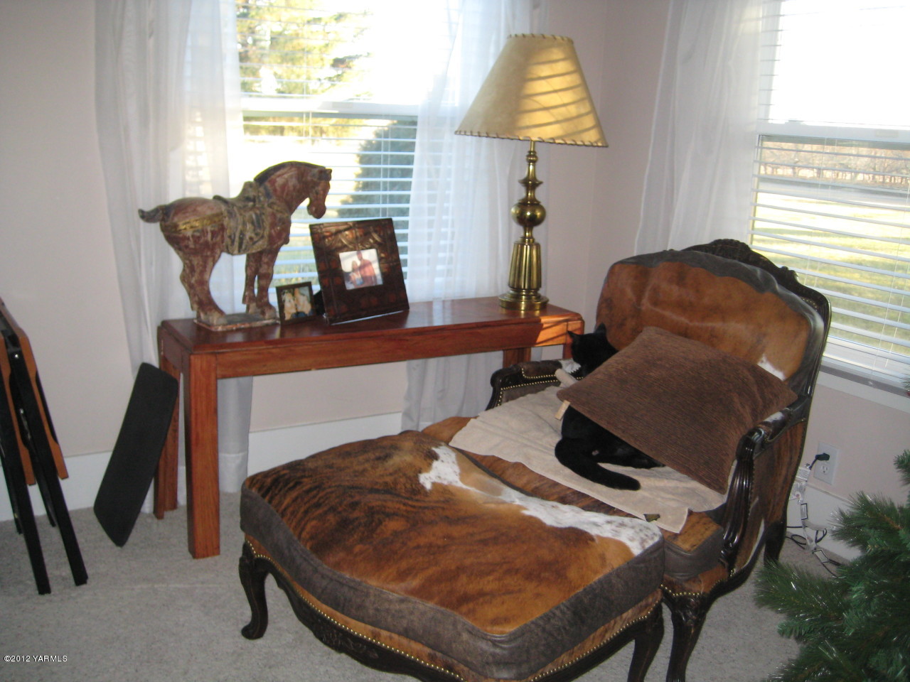 6591 West Wapato Road Wapato, WA 98951 - Photo 10 of 46 a bedroom with a bed and a window