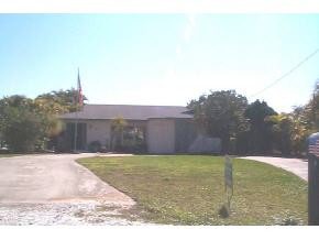 6 Hawk Street Naples, FL 34113 - Photo 1 of 1 a view of a backyard