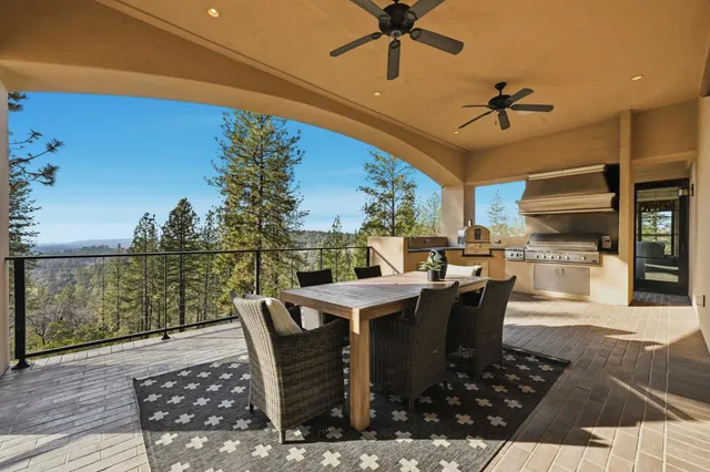 a bathroom with a double vanity sink a mirror and a shower