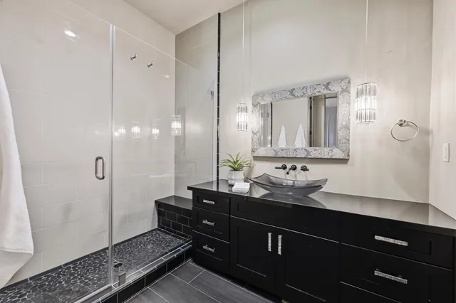 a view of a terrace with a table and chairs