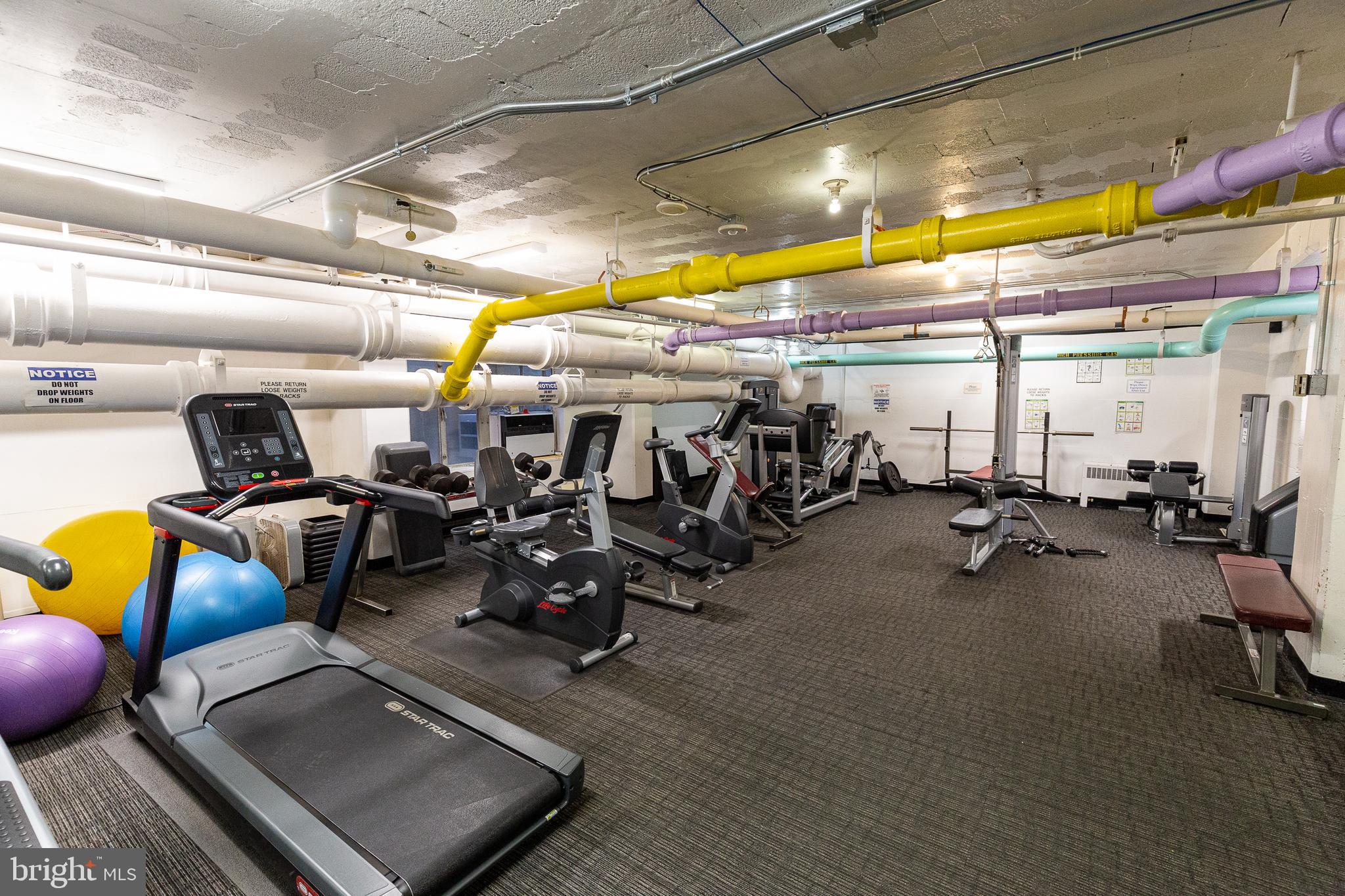 2475 Virginia Avenue Northwest, Unit 515 Washington, DC 20037 - Photo 19 of 22 a view of a room with gym equipment