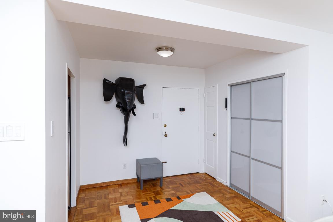 2475 Virginia Avenue Northwest, Unit 515 Washington, DC 20037 - Photo 7 of 22 a view of empty room with wooden floor