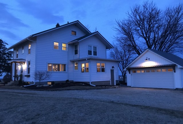 2153 Shattuck Road Garden Prairie, IL 61038 - Photo 1 of 1 a front view of a house with a yard