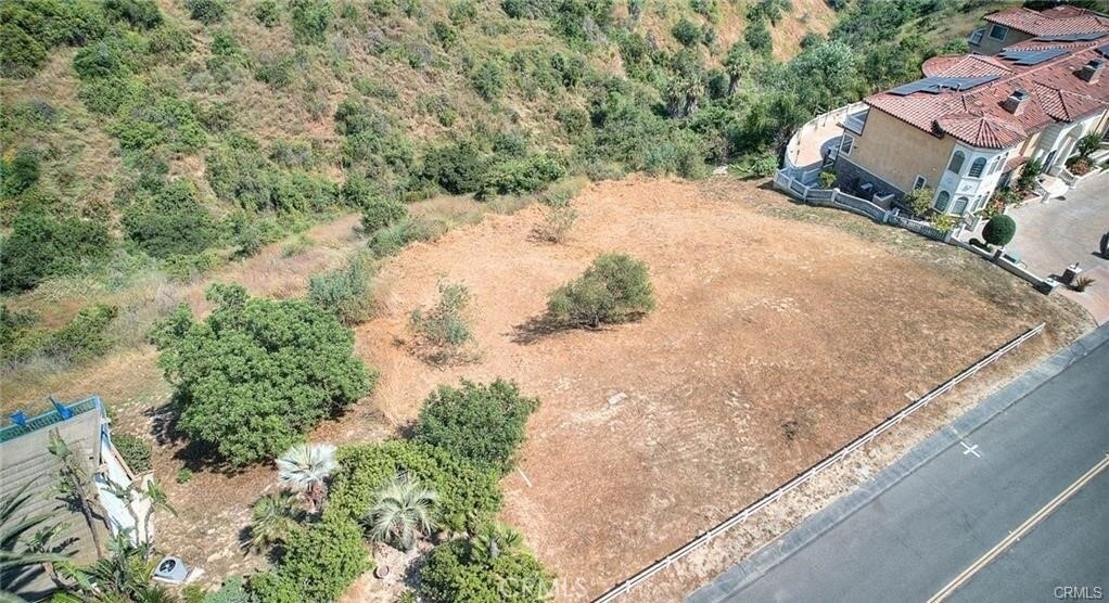 2690 Indian Creek Road Diamond Bar, CA 91765 - Photo 7 of 17 a view of a street with a houses