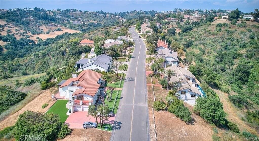 2690 Indian Creek Road Diamond Bar, CA 91765 - Photo 9 of 17 an aerial view of a city with lots of residential buildings