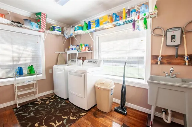 a utility room with a window dryer and washer