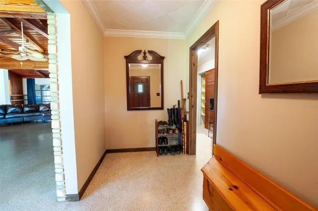 a view of room with furniture and workspace