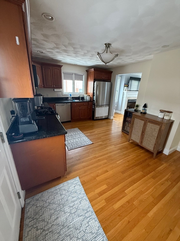 12 B Chester Road, Unit B North Reading, MA 01864 - Photo 3 of 12 a living room with furniture rug and window