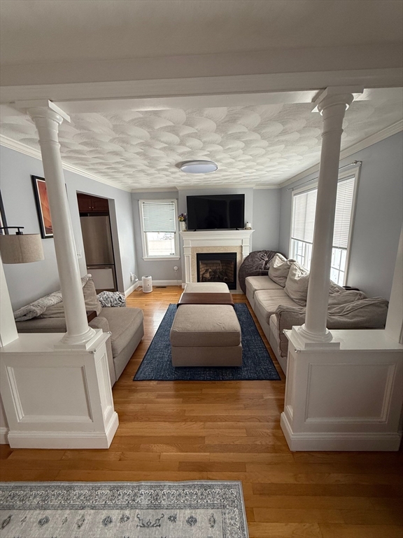 12 B Chester Road, Unit B North Reading, MA 01864 - Photo 4 of 12 a living room with furniture and a flat screen tv