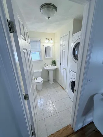a bathroom with a sink and toilet