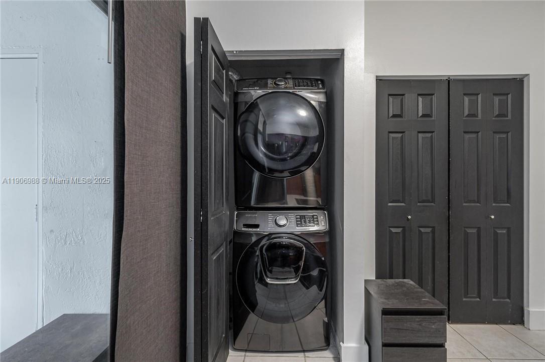 3310 Concert Lane, Unit 129 Margate, FL 33063 - Photo 5 of 5 a utility room with dryer and washer