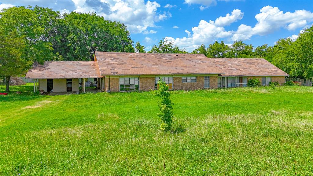604 Main Street Richland, TX 76681 - Photo 15 of 15 a view of house with garden