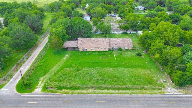 a view of a yard with a garden