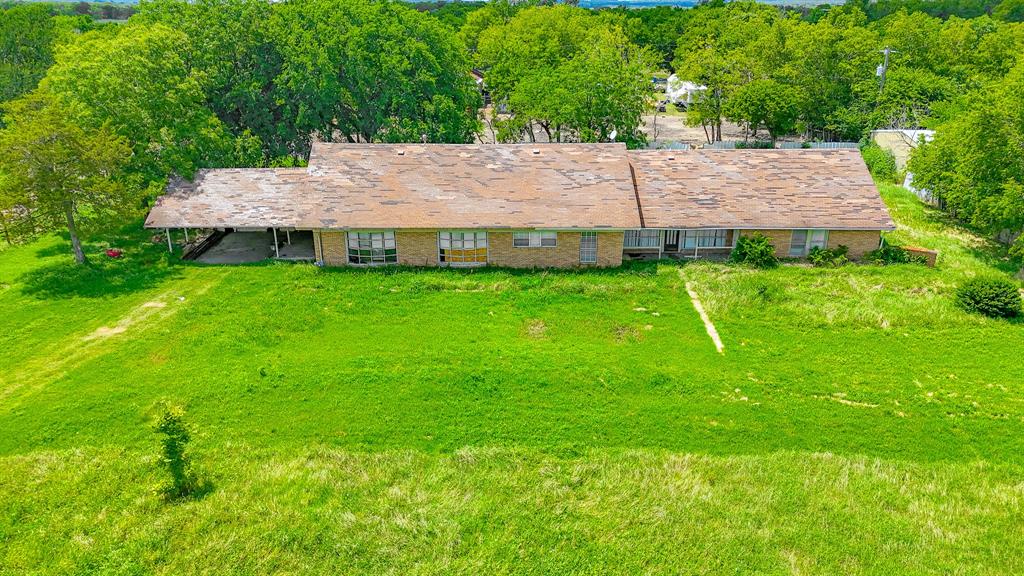 604 Main Street Richland, TX 76681 - Photo 10 of 15 a view of a backyard