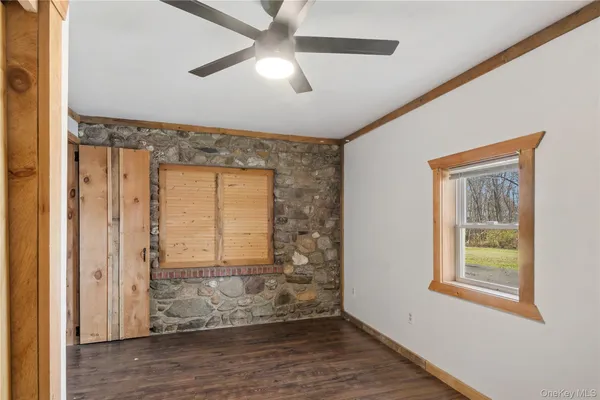 a view of entryway with wooden floor