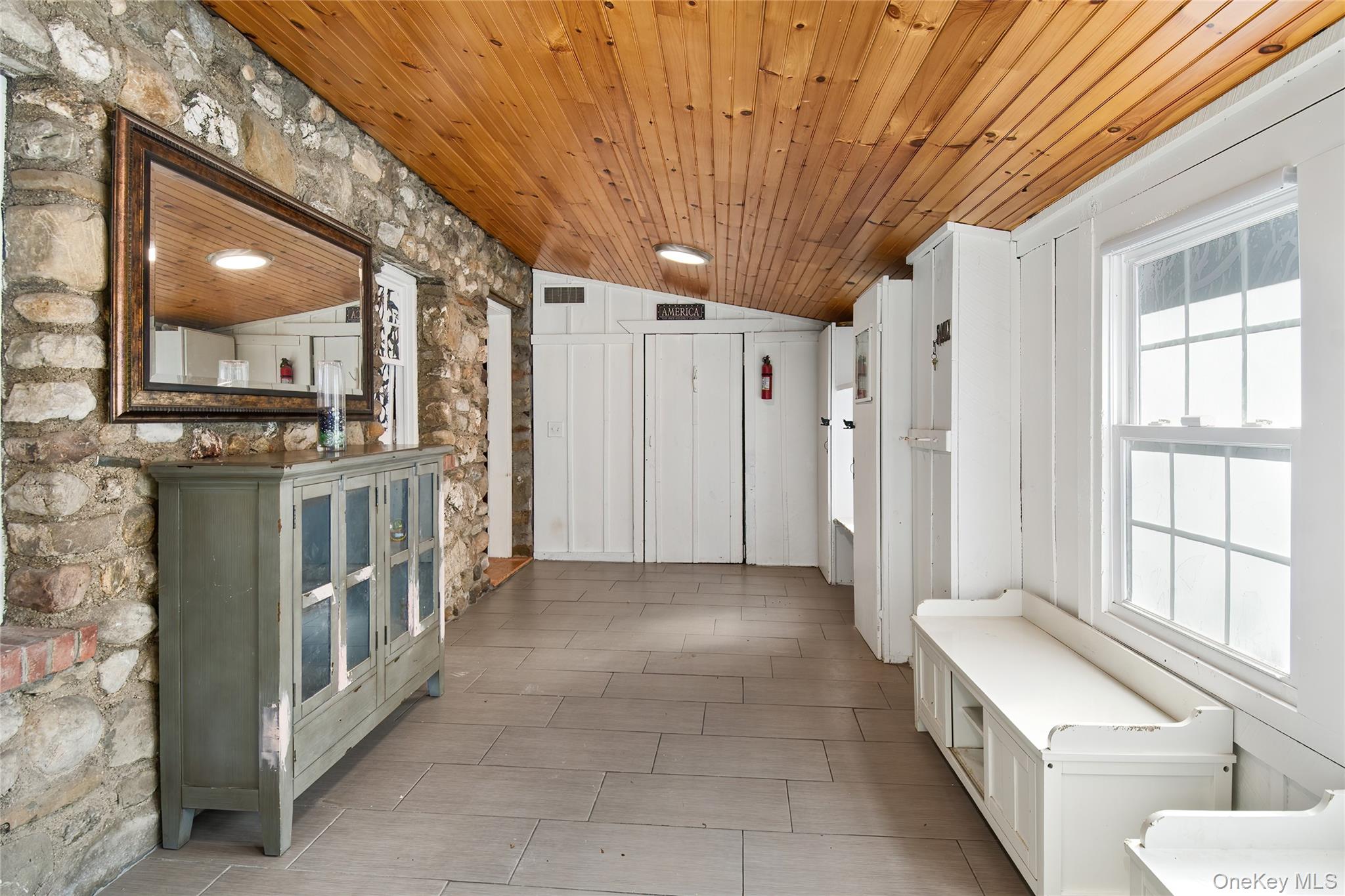 137 South Highland Road Wappingers Falls, NY 12590 - Photo 3 of 39 a bathroom with a double vanity sink a toilet and a shower