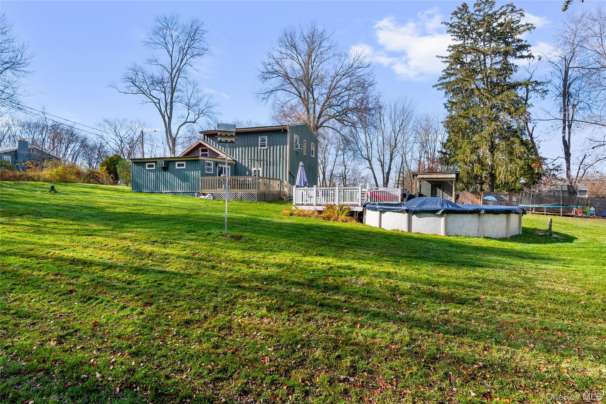137 South Highland Road Wappingers Falls, NY 12590 - Photo 31 of 39 a view of a house with a yard porch and sitting area