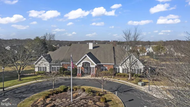 a view of multiple houses with a yard