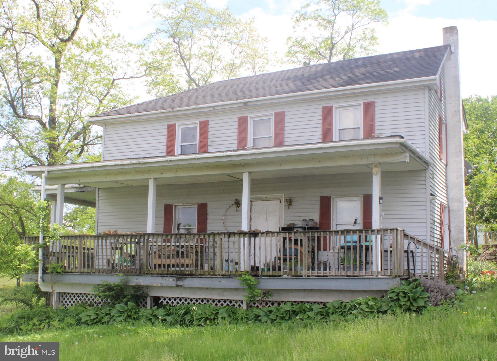 581 Throne Road Fawn Grove, PA 17321 - Photo 1 of 2 front view of house with a yard
