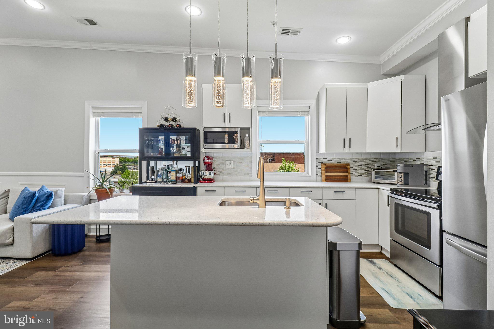 233 S Street Northeast, Unit 5 Washington, DC 20002 - Photo 14 of 41 Modern kitchen with sleek finishes.