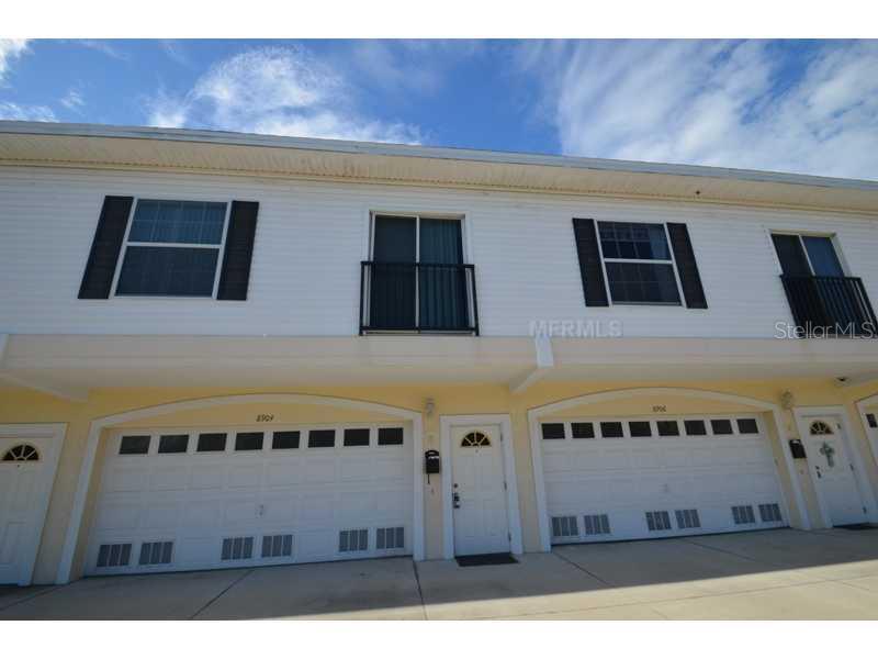 8906 Blind Pass Road St. Pete Beach, FL 33706 - Photo 1 of 1 Exterior Front - Walk to St Pete Beach, Treasure Island or the historic Corey Ave restaurants and shops from this boutique town home community located in St Pete Beach that was built in 2003 and allows pets up to 30 lbs!