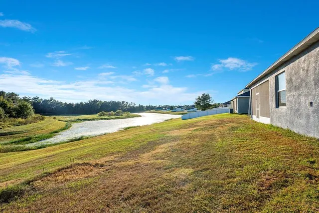 a view of swimming pool with an ocean view