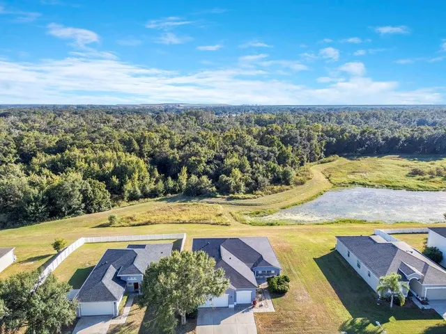 a view of a swimming pool with an ocean view