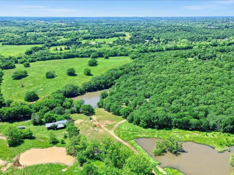 1747 Desvoignes Road Denison, TX 75021 - Photo 25 of 40 a view of a lush green space