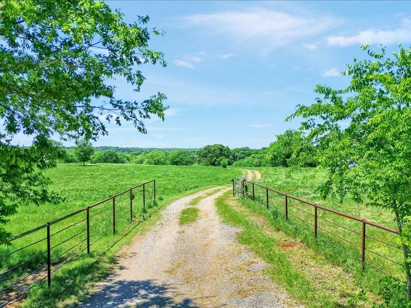 1747 Desvoignes Road Denison, TX 75021 - Photo 5 of 40 a view of a garden with a lake view